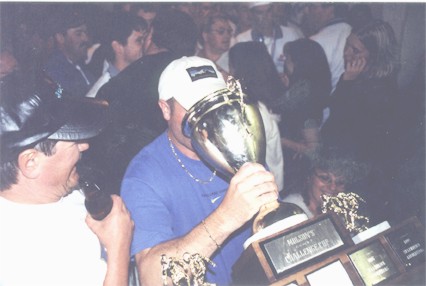 Brent Tarrant Drinks From Cup