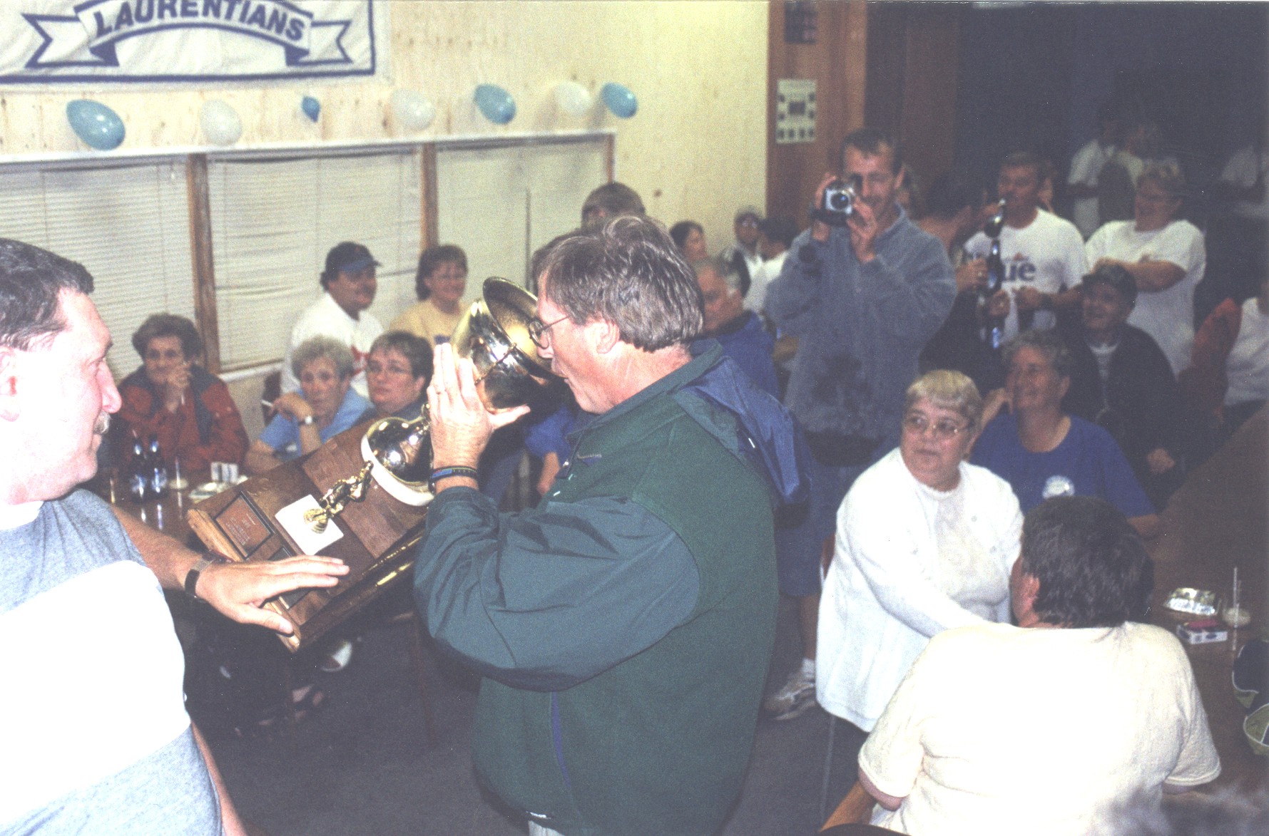 Tony Etchegary Drinks From Cup